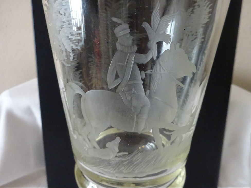 Wine glass with a falconer